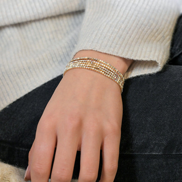 Golden Multistrand Cream Bracelet Stack