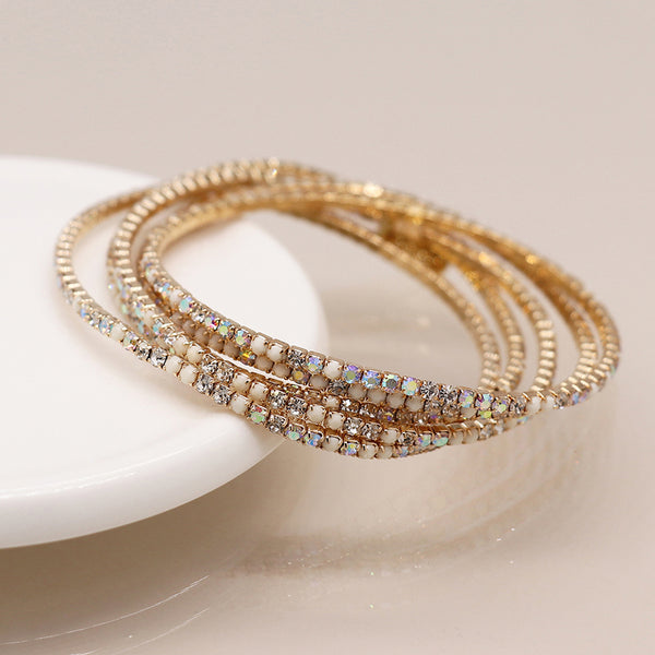 Golden Multistrand Cream Bracelet Stack