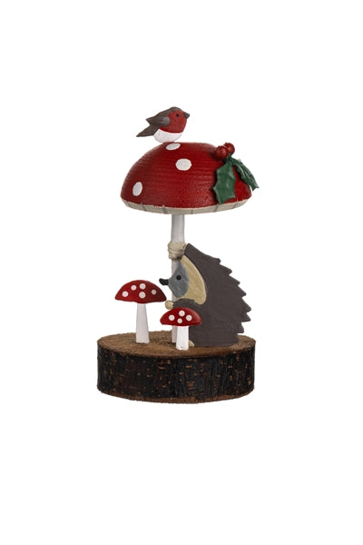 Hedgehog Under Toadstool On Wooden Block