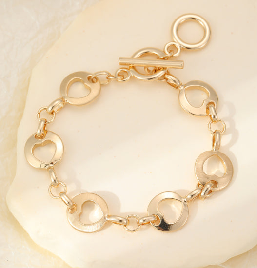 Gold Circles Cut Out Heart Bracelet